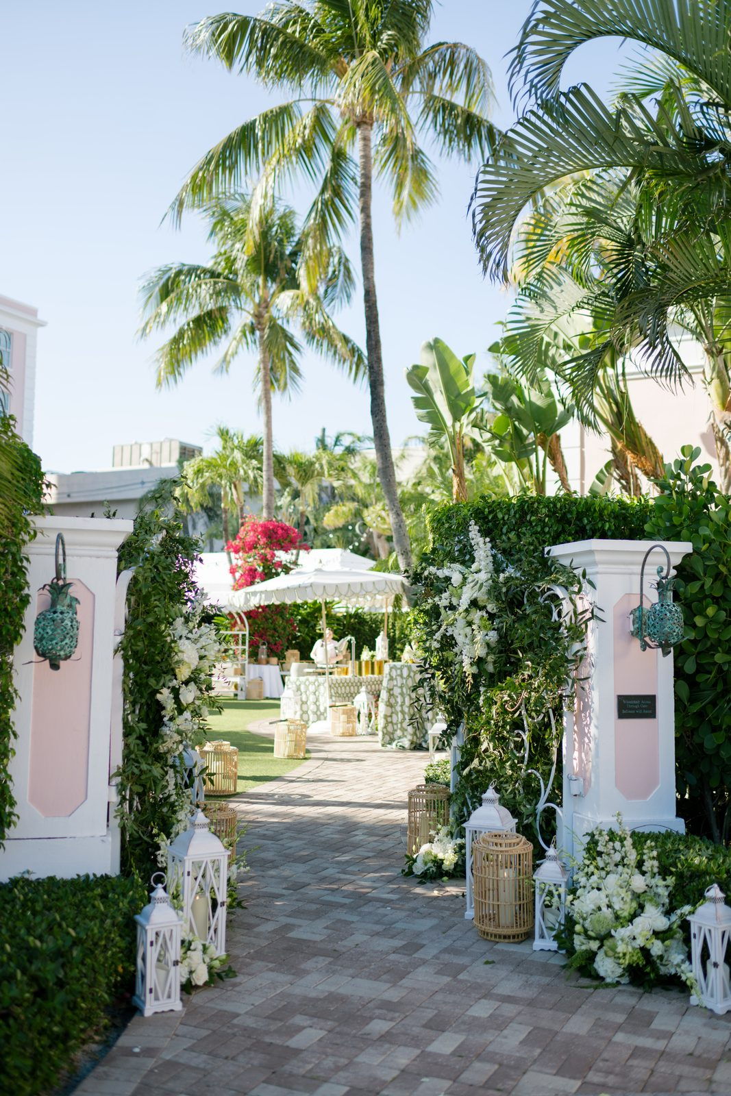 Palm-lined venue entrance walkway